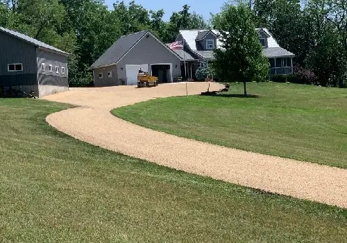 A driveway for a residential property with recent Tar and Chip Paving in LaSalle IL