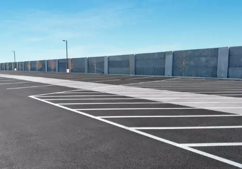 A fresh asphalt surface is seen. Berchtold Asphalt are Asphalt Contractors in Rock Island IL