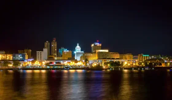 The Peoria skyline from across the river at night