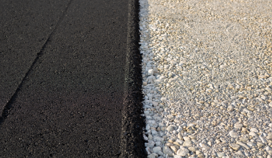 Professional asphalt services Peoria IL provided by Berchtold Asphalt for a roadway.