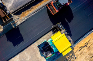 A new asphalt road under construction from Berchtold Asphalt in Galesburg IL